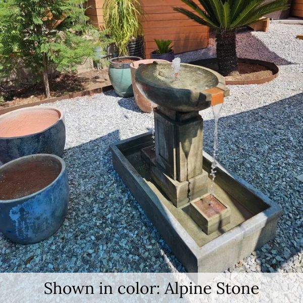 Austin Fountain on gravel in the backyard