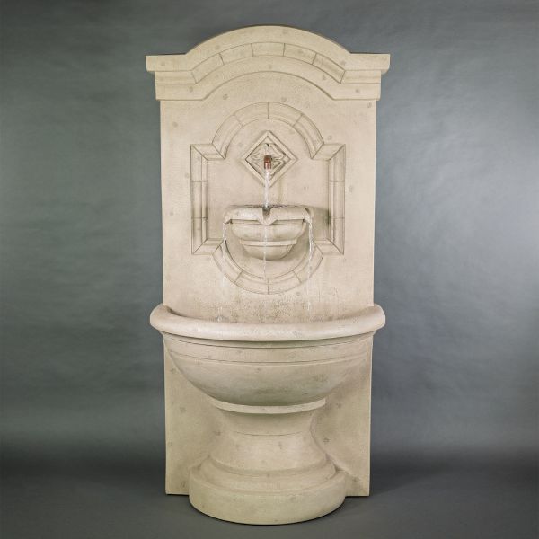 Corsica Wall Fountain against gray background.
