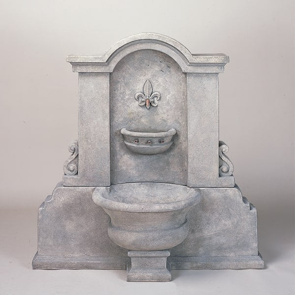 Flaminia Wall Fountain against gray background.
