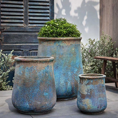 Jerez Planter - Blue Verdigris - S/3 on concrete filled with plants