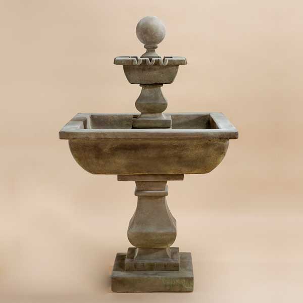 Quadratum Fountain against brown background.
