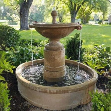 Campania Borghese Fountain in action surrounded green plants