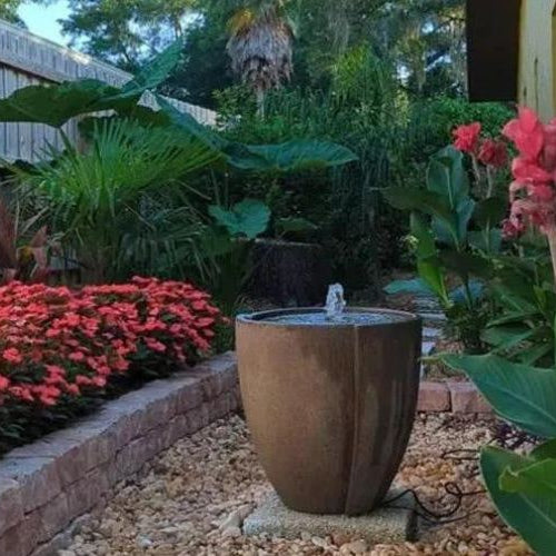 Concept Basin Fountain on gravel in backyard