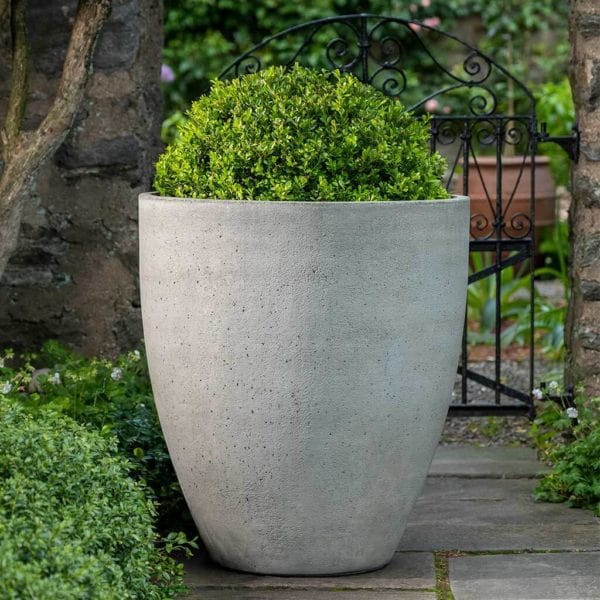 Design.Urb Collection Image of Series 3-28 inch by 31 inch planter on stone patio.
