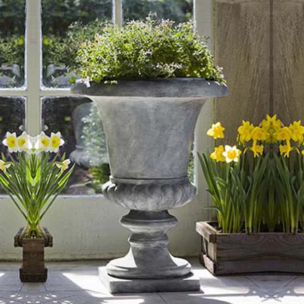 Fiberglass Planters Collection Image of Morganna Lite Urn - Lead Lite - S/1 filled with plants.