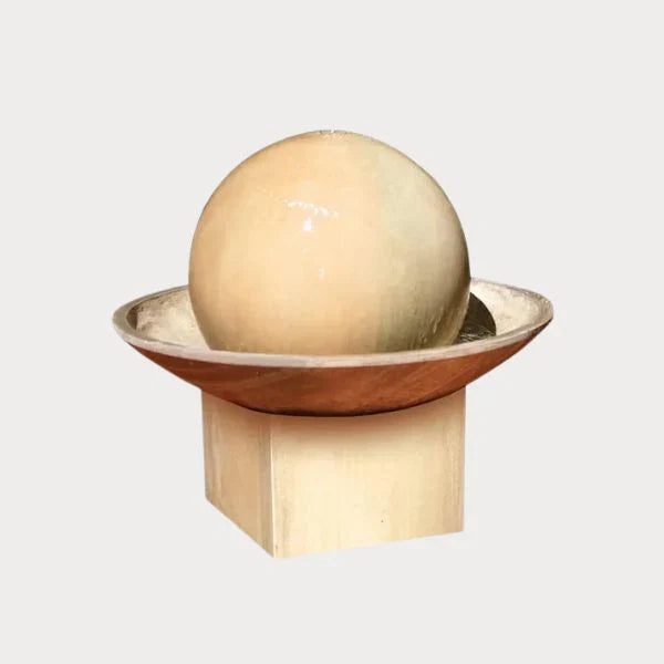 Gist Concrete Products Collection Image of Ball Wok with Pedestal Fountain against gray background.