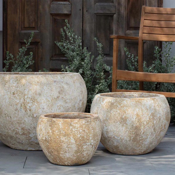Glazed Terra Cotta Planter Collection Image of Coronado Planter - Vicolo Gesso - S/3 beside wooden chair.