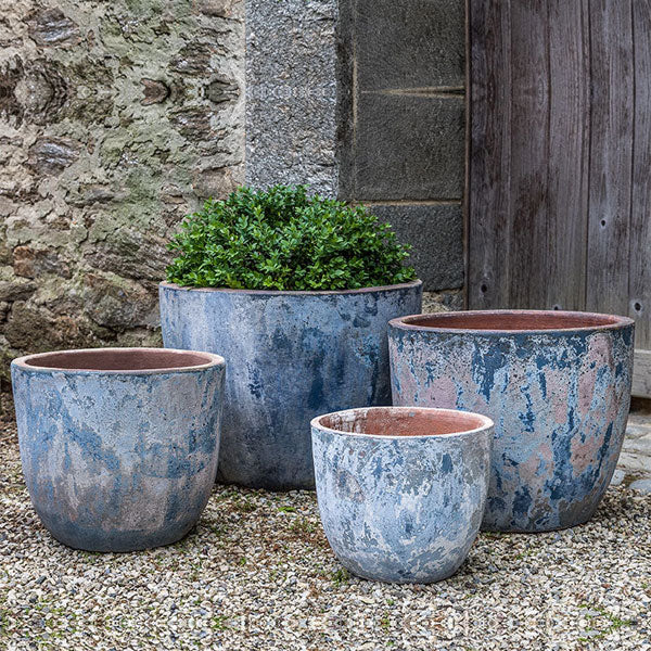 Mediterranean Planters Collection Image of Cassia Planter - Vicolo Mare - S/4 filled with plants.