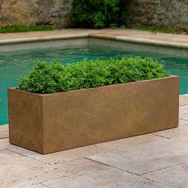 Rectangular Planters Collection Image of Rustic Trough Planter filled with plants.