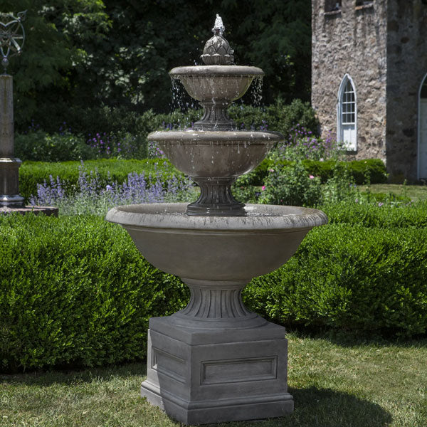 Tall Outdoor Fountains of Luberon Estate Fountain in the backyard.
