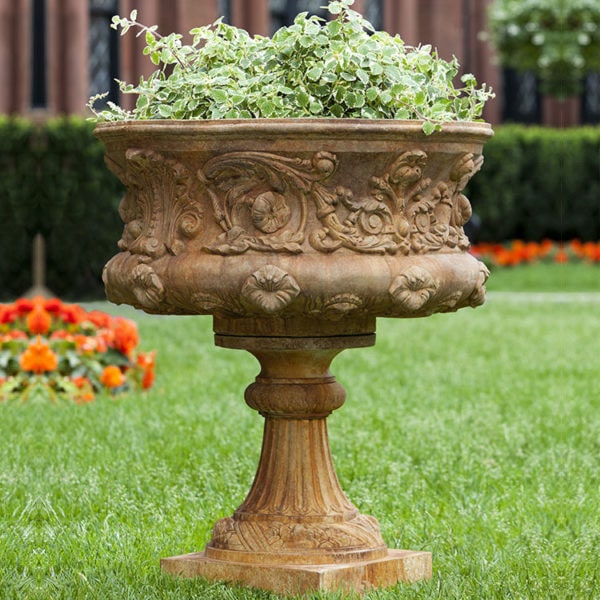 Urn Planters with Pedestal Collection Image of Smithonian Morning Glory Urn on grass in the backyard.
