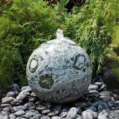 24 Inch Green Marble Sphere Fountain on black pebbles in action