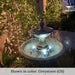 Acanthus Two Tiered Fountain in action against lighted plants