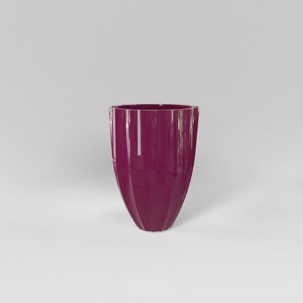 Alicante Tapered Fluted Round Fiberglass Planter in gloss eggplant against gray background.