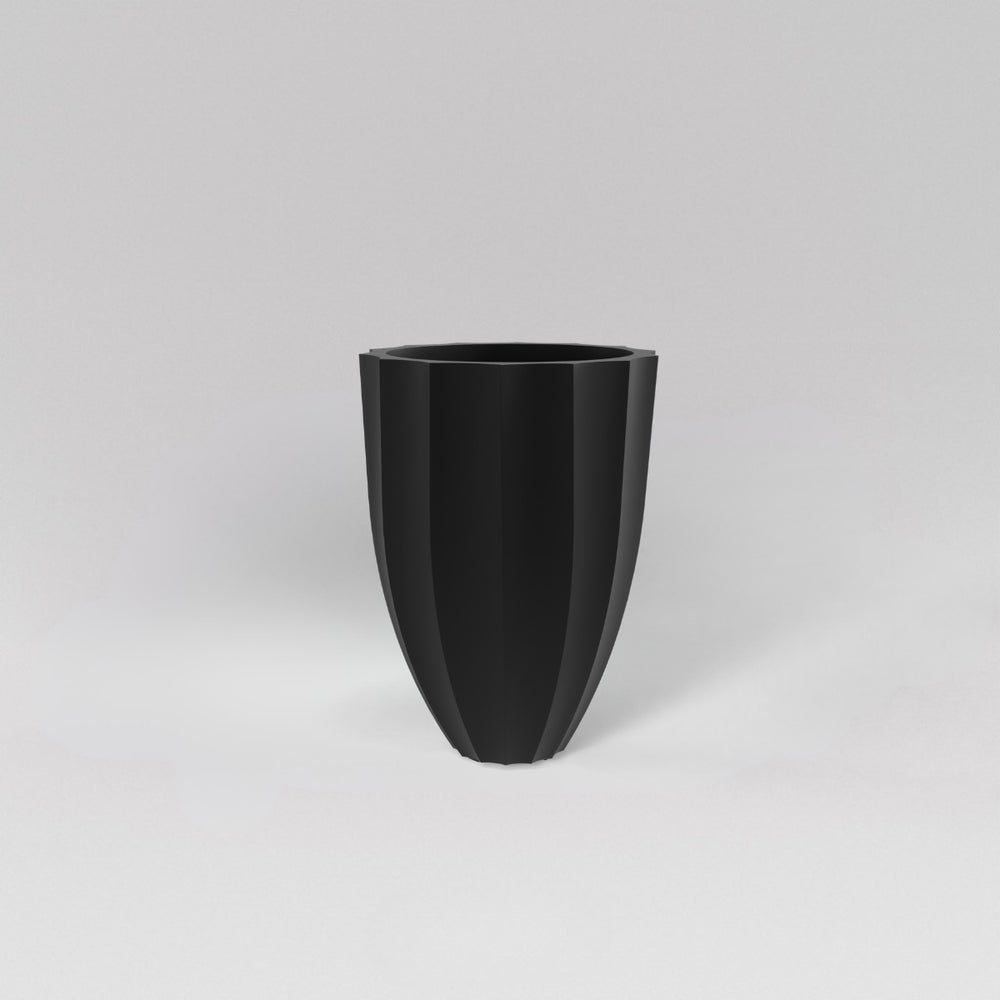 Alicante Tapered Fluted Round Fiberglass Planter in matte black against gray background.