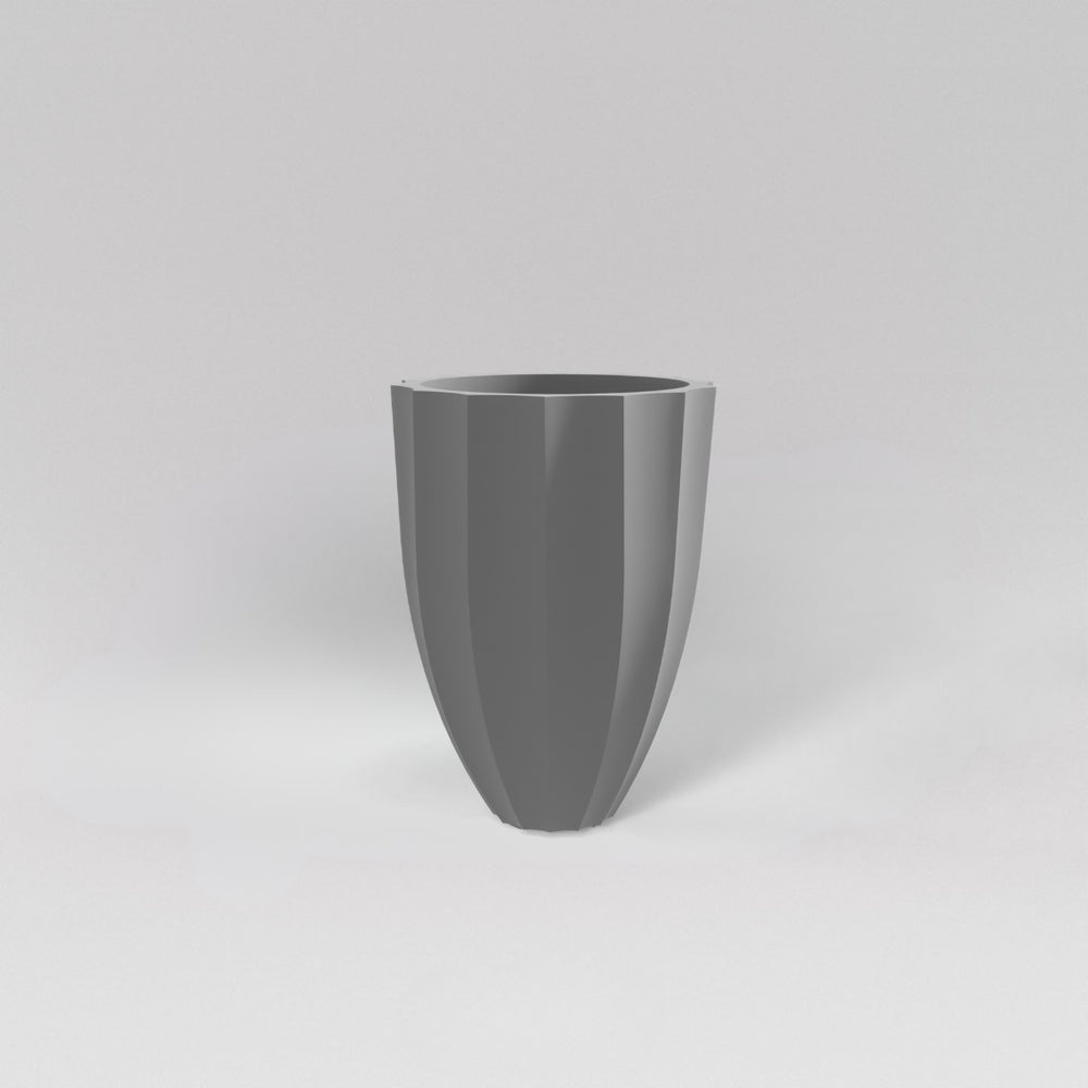 Alicante Tapered Fluted Round Fiberglass Planter in matte cement grey against gray background.