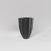 Alicante Tapered Fluted Round Fiberglass Planter in matte gunmetal against gray background.
