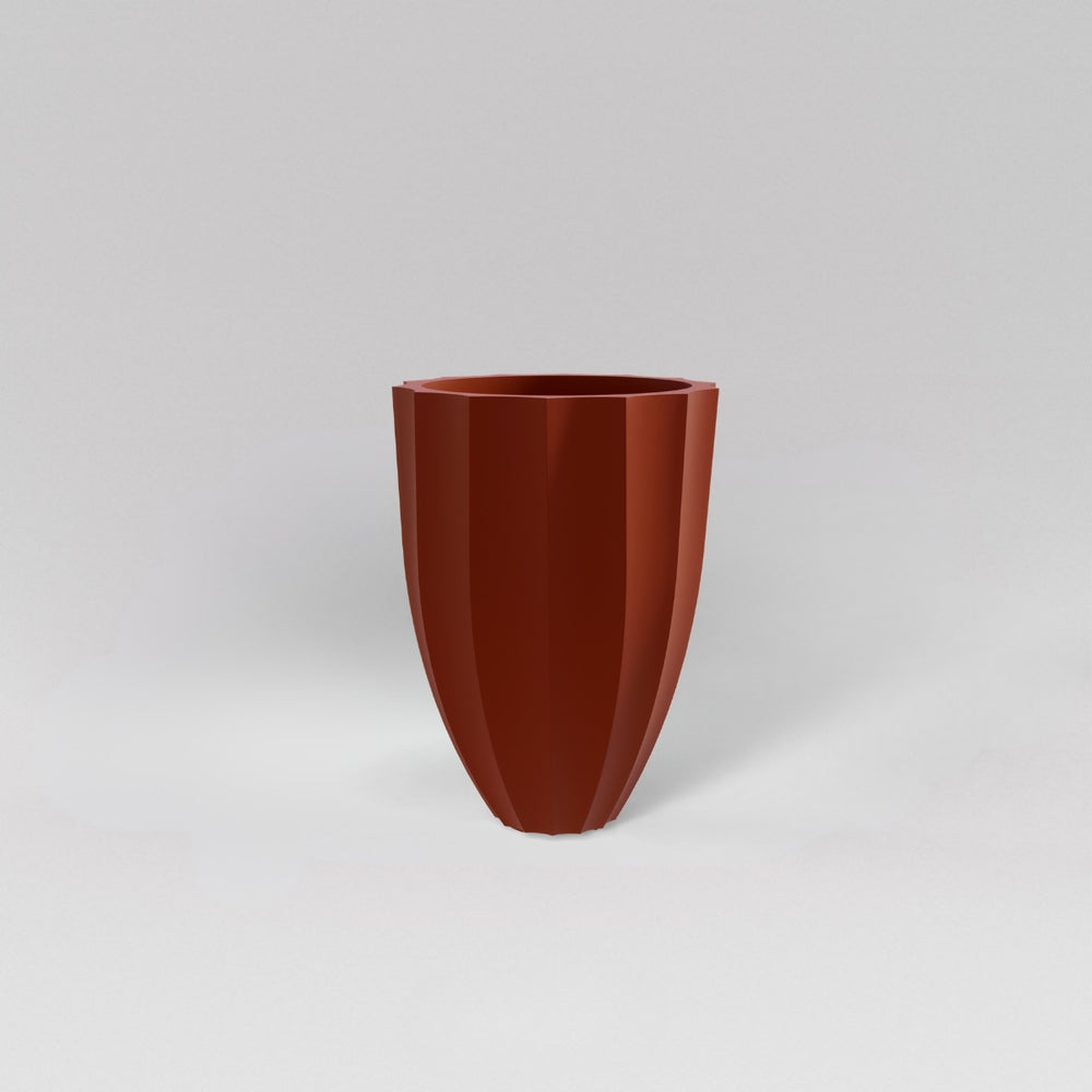 Alicante Tapered Fluted Round Fiberglass Planter in matte terra cotta against gray background.