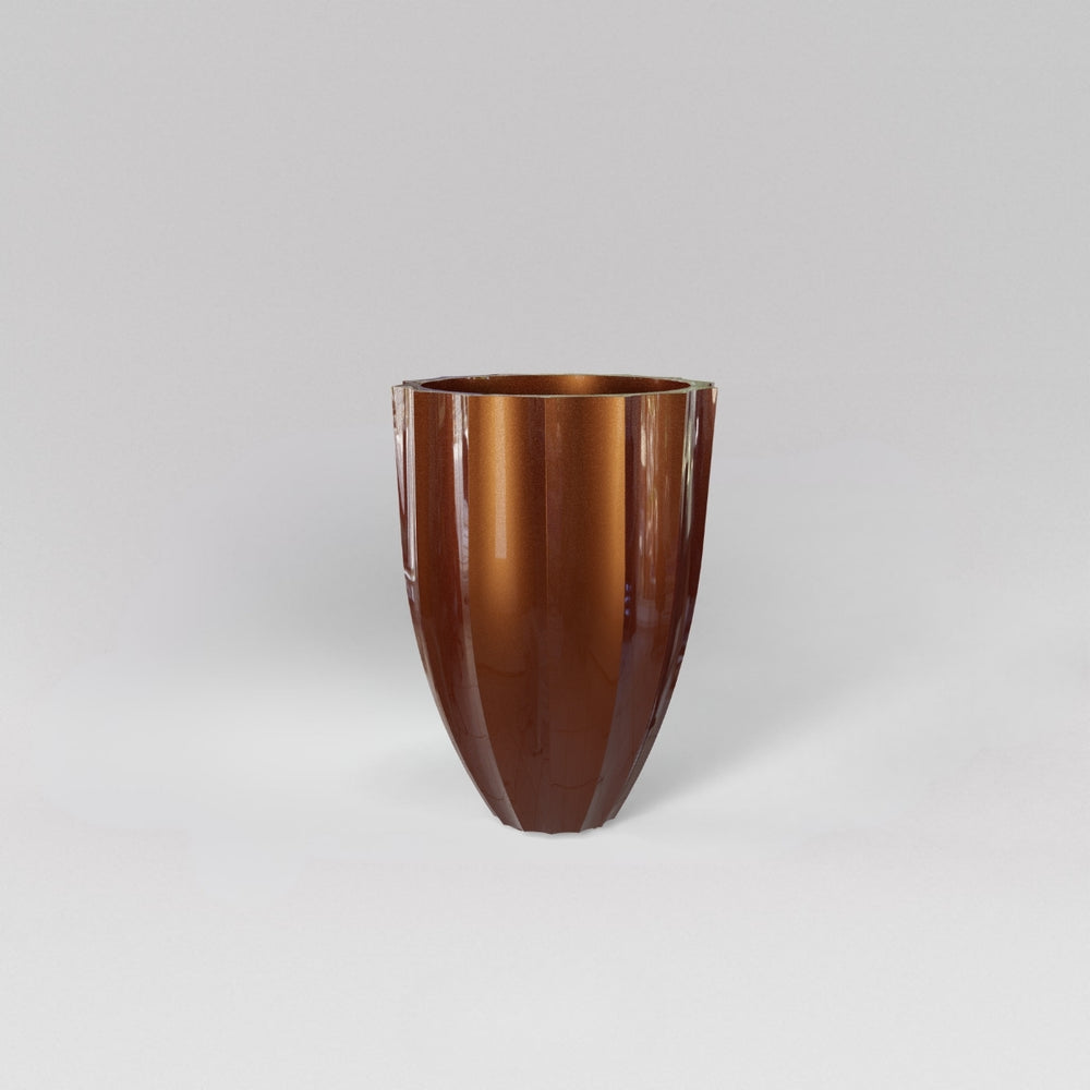 Alicante Tapered Fluted Round Fiberglass Planter in metallic bronze against gray background.