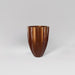 Alicante Tapered Fluted Round Fiberglass Planter in metallic bronze against gray background.