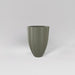 Alicante Tapered Fluted Round Fiberglass Planter in satin beige against gray background.