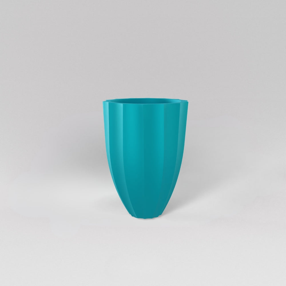 Alicante Tapered Fluted Round Fiberglass Planter in satin seafoam green against gray background.