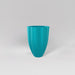 Alicante Tapered Fluted Round Fiberglass Planter in satin seafoam green against gray background.