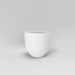Alzira Round Fiberglass Planter in matte bright white against gray background.