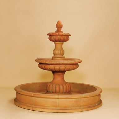 Ambra Two Tier Pond Fountain against brown background.