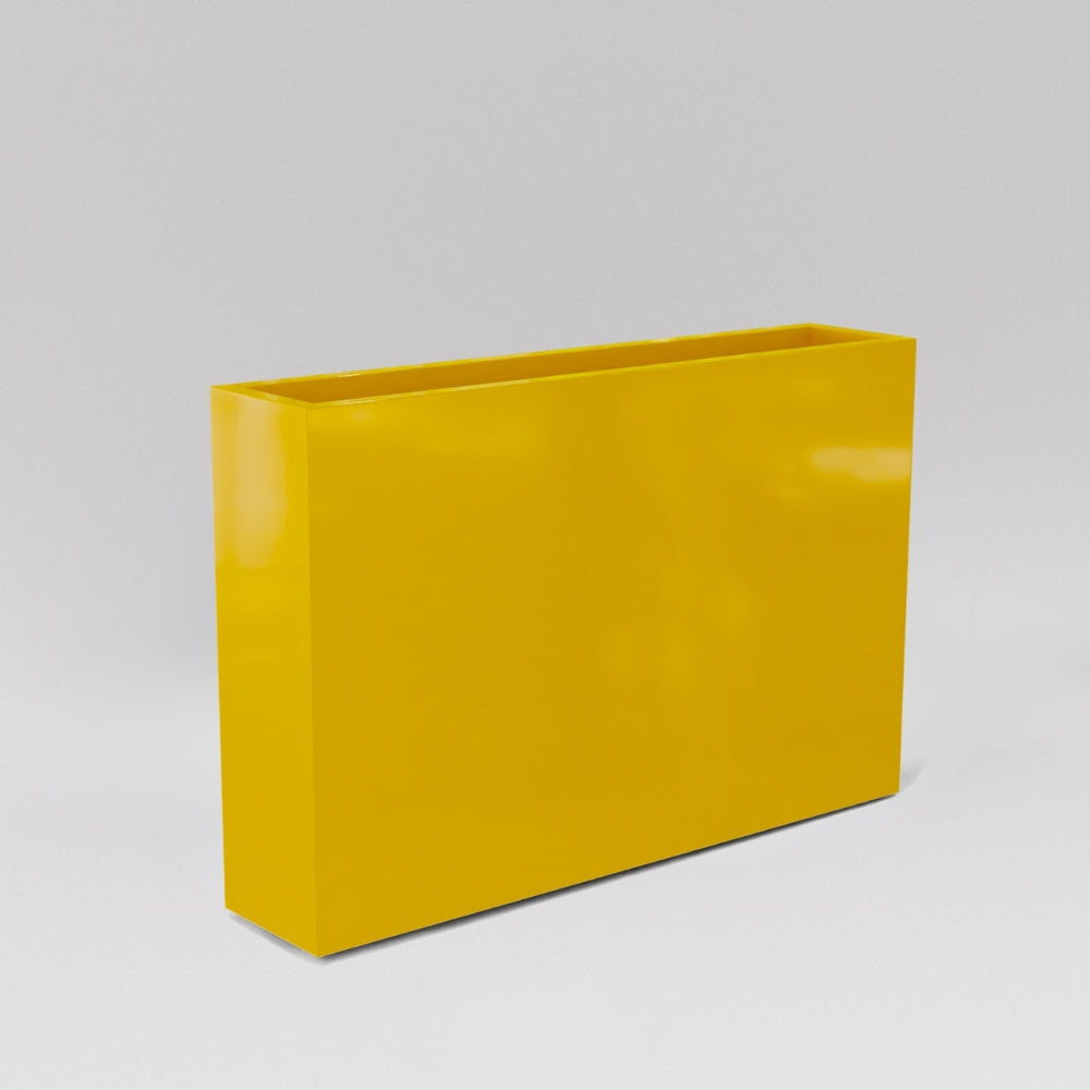 Amesbury Narrow Rectangle Planter in gloss saffron against gray background.
