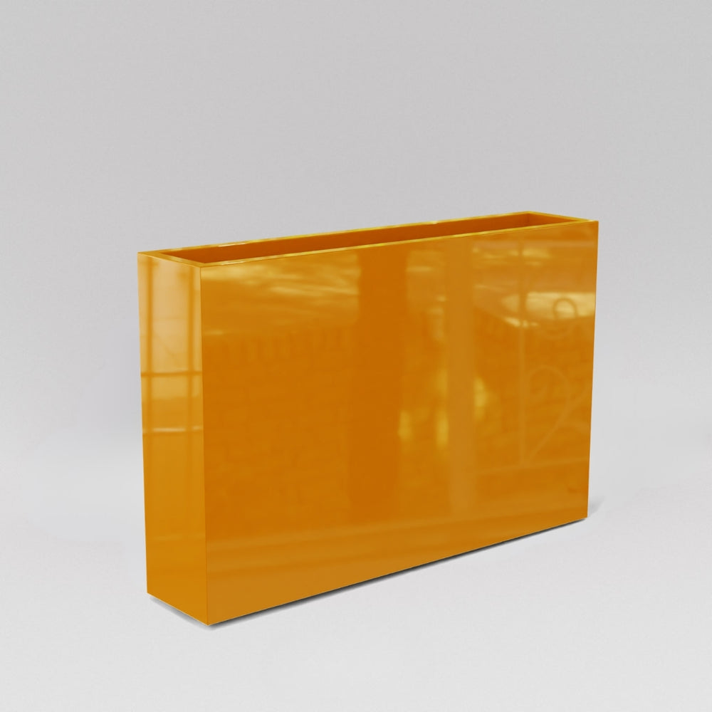 Amesbury Narrow Rectangle Planter in gloss tangerine against gray background.