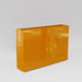 Amesbury Narrow Rectangle Planter in gloss tangerine against gray background.
