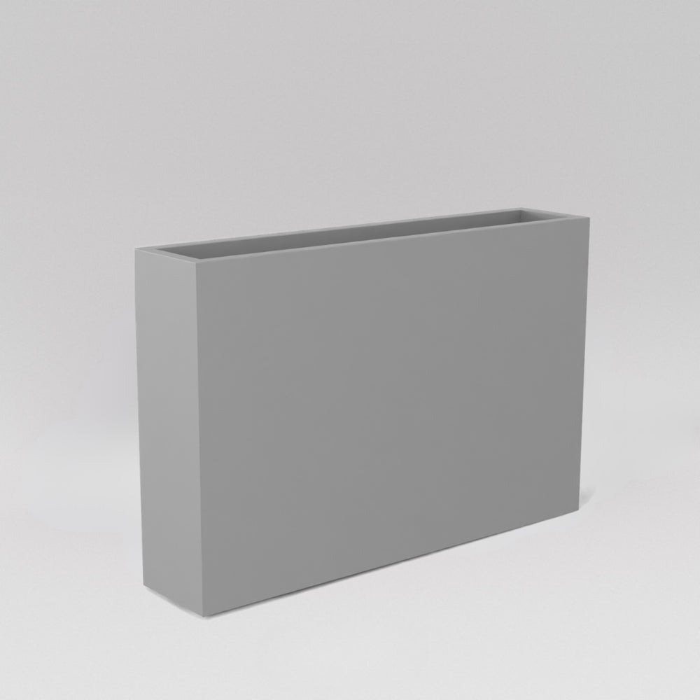 Amesbury Narrow Rectangle Planter in matte cement grey against gray background.