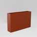 Amesbury Narrow Rectangle Planter in matte terra cotta against gray background.