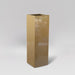 Amesbury Tall Corner Planter in gloss metallic gold against gray background.