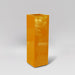 Amesbury Tall Corner Planter in gloss tangerine against gray background.