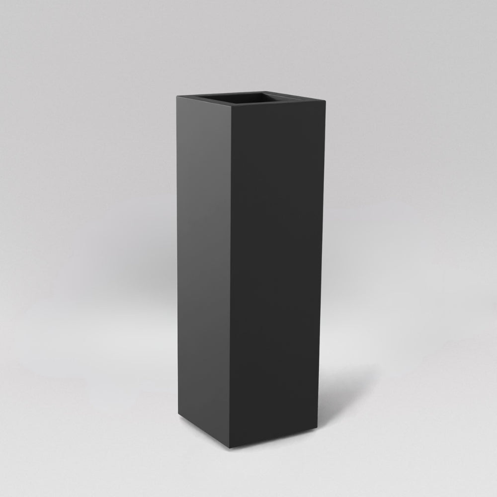Amesbury Tall Corner Planter in matte charcoal against gray background.