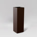 Amesbury Tall Corner Planter in matte dark brown against gray background.