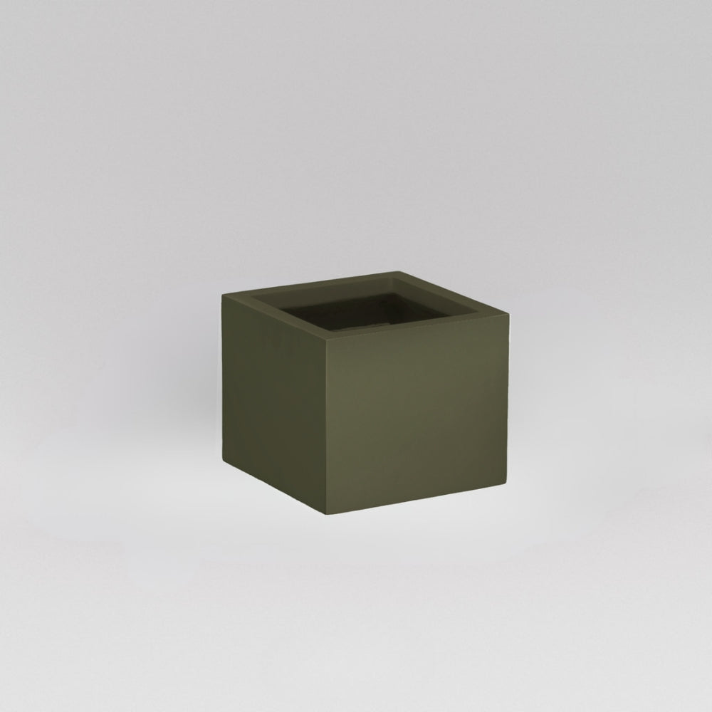 Antwerp Corner Fiberglass Planter in matte bronze against gray background.