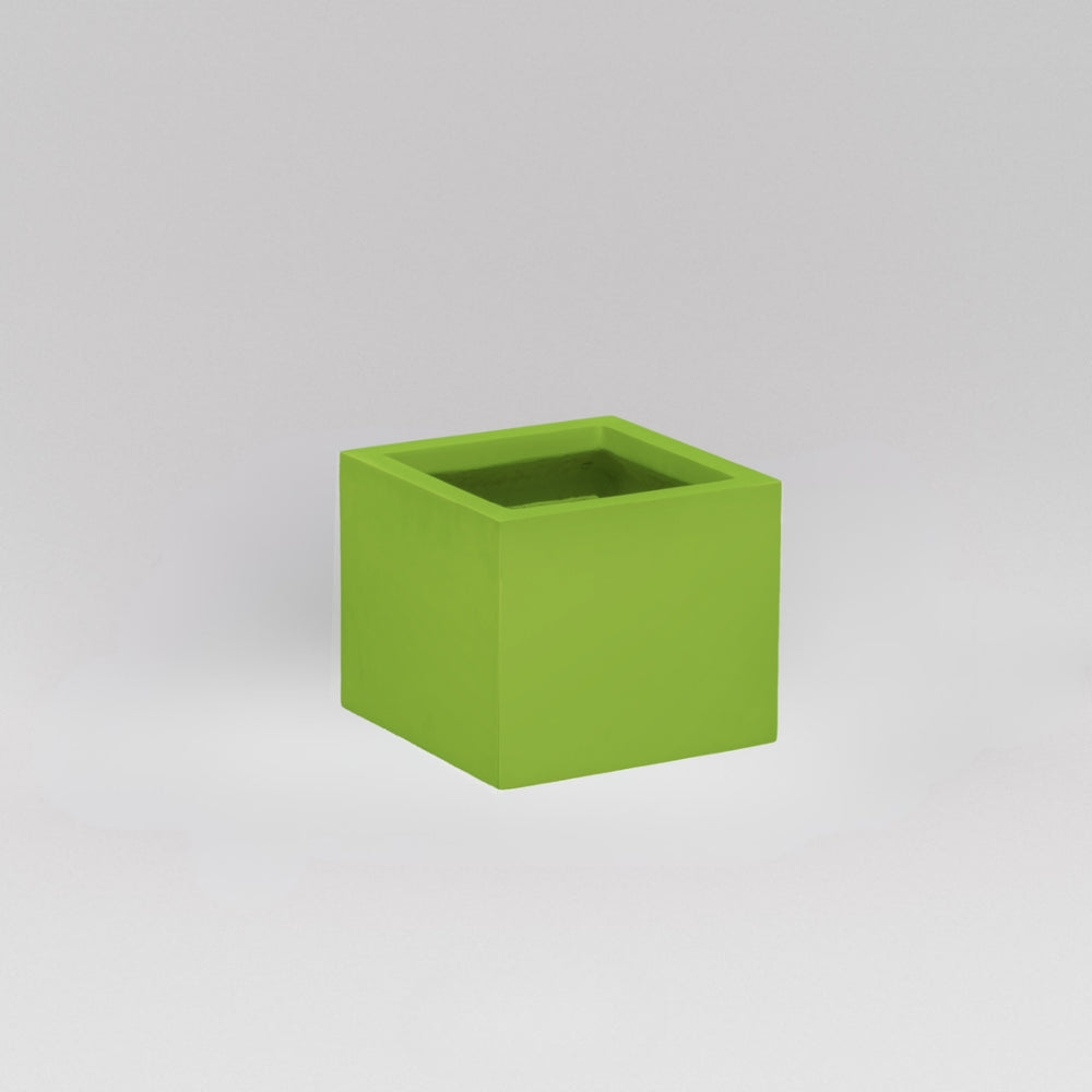 Antwerp Corner Fiberglass Planter in satin green against gray background.