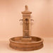 Aquitaine Pond Fountain against brown background.