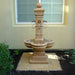 Avignon Courtyard Fountain in action against house window.