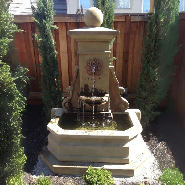 Avignon Wall Fountain in the backyard.