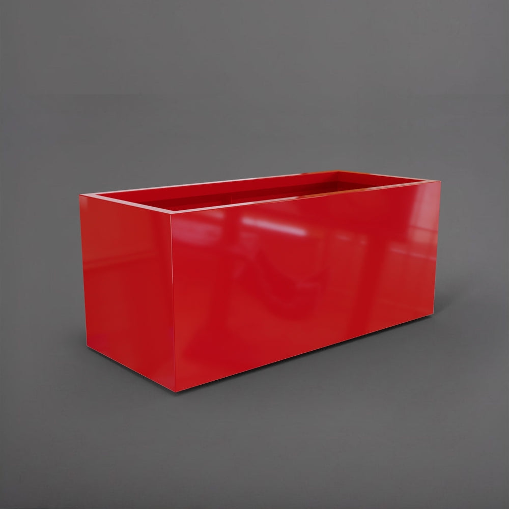 Badalona Rectangle Fiberglass Planter in gloss red against gray background.