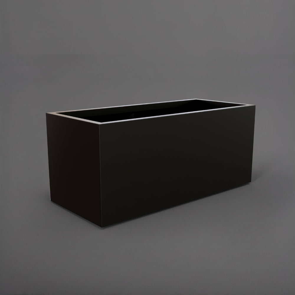 Badalona Rectangle Fiberglass Planter in matte black against gray background.