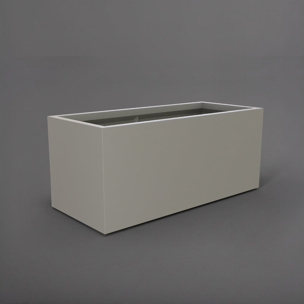 Badalona Rectangle Fiberglass Planter in matte cement grey against gray background.