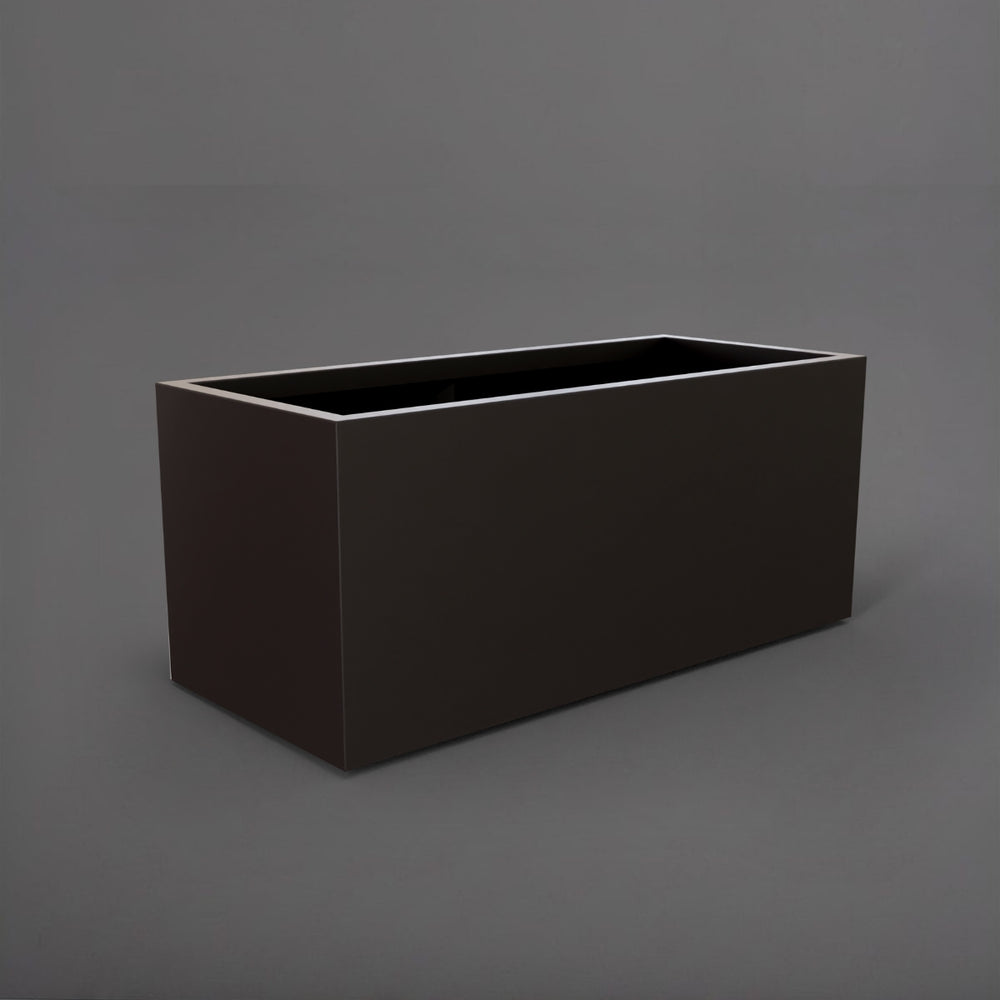 Badalona Rectangle Fiberglass Planter in matte charcoal against gray background.