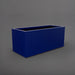 Badalona Rectangle Fiberglass Planter in matte cobalt blue against gray background.
