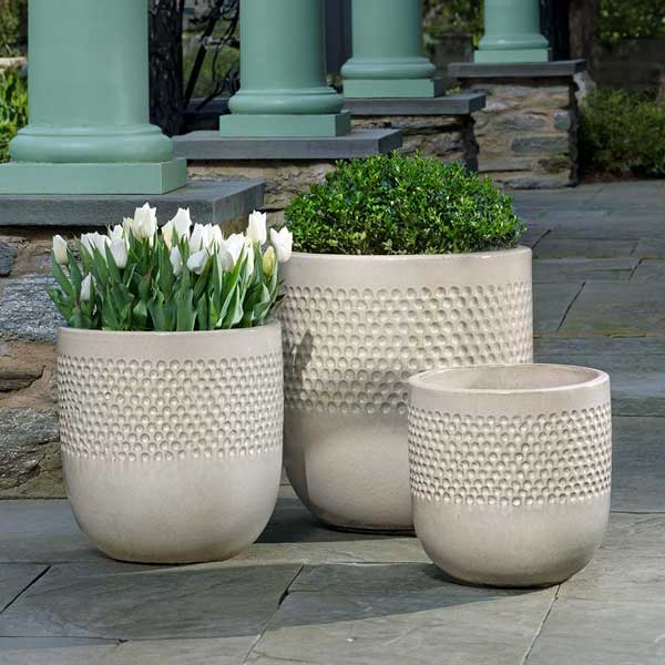 Banded Coin Pot - Cream - S/3 on concrete filled with plants