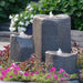 Basalt Bird Bath Fountain Kit in action in the backyard